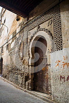 Typical street of Fez El Bali Medina. Fez, Morocco.