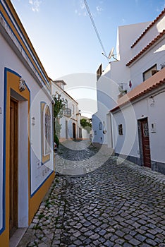 Typical street in the fishermen village of Ferragudo near Portimao