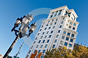 Typical Streetlamp and Tower in Barcelona