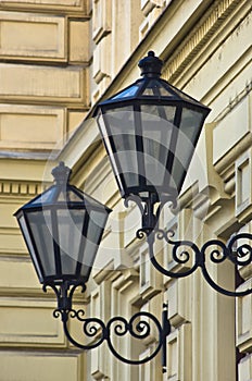 Typical stylish lanterns on 19th century neoclassic building dominant in Vienna photo