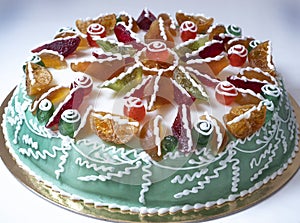 typical sweet sicilian cassata decorated with candied fruit