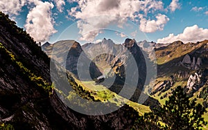 Typical swiss mountain scenery with mountain lake during sunny summer day