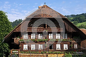 Typical Swiss wooden house in mountain village