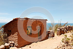Typical Tequile Island mud home on Lake Titicaca, Peru