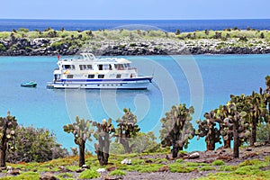 Typical tourist yacht anchored between South Plaza and North Plaza islands, Galapagos National Park, Ecuador