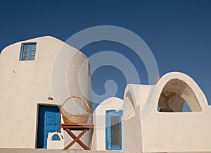 A typical and traditional white house in Oia, Santorini, Greece