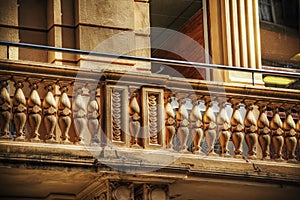 Typical Tuscan balcony in a yellow building