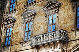 Typical Tuscan balcony in a yellow building