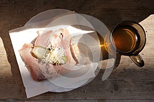 Typical tyrolean snack meal. Ham sandwich with apple cider or must. Originally called Brettljause with Most or Sturm photo