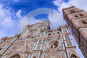 Typical urban view of Florence: the main facade of Cathedral of Santa Maria del Fiore with Giotto\'s Bell Tower, Italy.