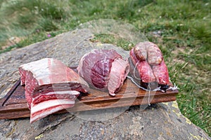 Typical Uruguayan and Argentine Asado Cooked on fire. Entrana and Vacio meat cuts. Accompanied with Chorizo photo