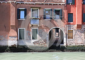 typical Venetian houses with the I do on the navigable channel i
