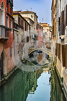 Typical Venice canal with gondola, Italy