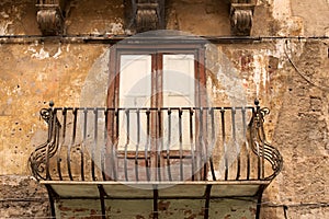 Typical view of the balcony in the historic city. Old house. Palermo. Sicily