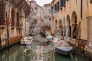 Typical view of the narrow side of the canal, Venice, Italy. Communication in the city is done by water, which creates a