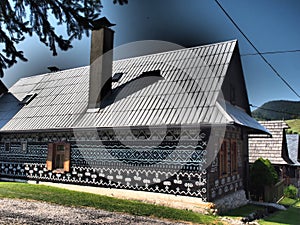 The typical village CICMANY surrounded by the mountains Strazovske vrchy and Mala Fatra in the southern part of the valley Rajecka