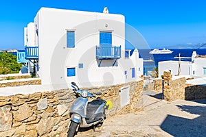 Typical white Greek house with blue windows in beautiful Mykonos town, Cyclades islands, Greece