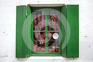 Typical window from Hondarribia with red chillies