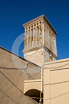 Typical Windtower made of clay taken in the streets of Yazd, iran. These towers, aimed at cooling down buildings in the desert