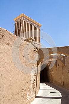 Typical Windtower made of clay taken in the streets of Yazd, iran. These towers, aimed at cooling down buildings in the desert