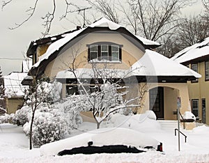 Typical Wisconsin house after heavy snow fall photo