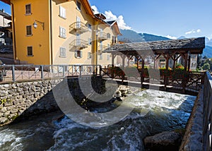 The typical wood bridge with flowers simbol of the town of Ponte di Legno, Brescia province, Italy