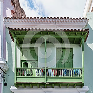 Typical wooden balcony of colonial Spanish style residential house in historic center of Havana,Cuba