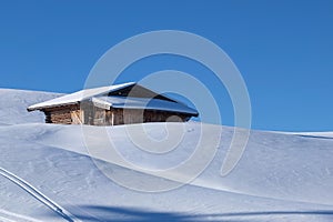 Typical wooden challet in the Dolomites