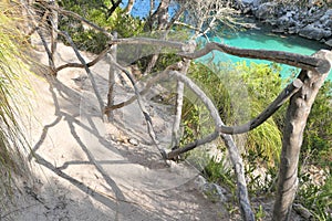 Typical wooden fence at Cala Macarelleta bay on Menorca photo