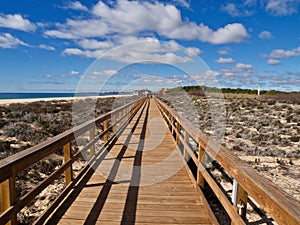 Typical wooden foot path along the beach between Vilamoura and Albufeira