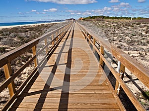 Typical wooden foot path along the beach between Vilamoura and Albufeira