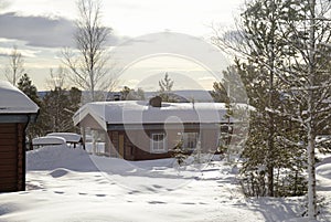 Typical wooden houses in Sweden during winter