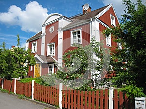 Typical wooden red house. Linkoping. Sweden photo