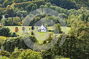 typical wooden small farm house in victorian style in Bennington