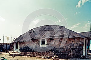 Typically Built Old Stone House, in Poor Condition, Metal Roof. Shillong