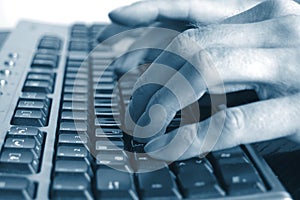 Typing hands on keyboard