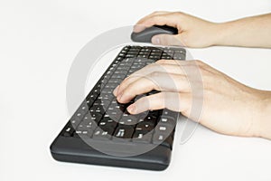 Typing on a keyboard and mouseing