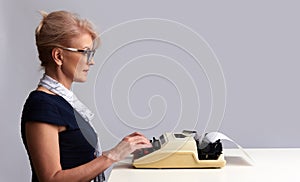 Typist. Woman with typewriter. Isolated