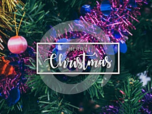 Typographical Merry Christmas Banner. Colorful Christmas background with blurred Christmas prop decoration on Christmas