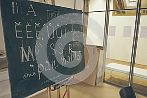 Typography lesson with blackboard with handwritten chalk letters