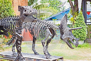 Tyrannosaurus Dinosaur made of remnant of iron in public park