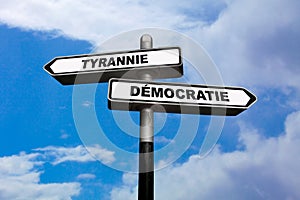Tyranny or Democracy - Direction signs photo