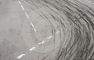 Tyre burnout marks on asphalt road