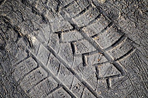 Tyre tread imprint in asphalt