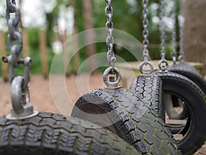 Tyres hanging on chains lined up on an obstacle course