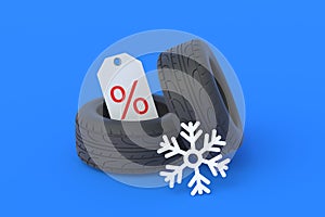 Tyres near snowflake and label with percent symbol. Special offer