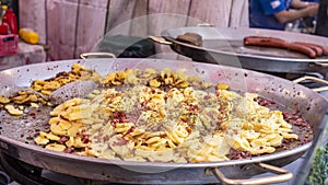 A Tyrolean grÃ¶stl in a large frying pan