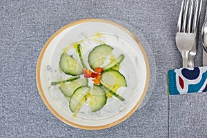 Tzatziki a la carte appetiser meal dip in a bowl photo