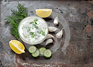 Tzatziki sauce Fresh dip with herbs dill mint Food photo