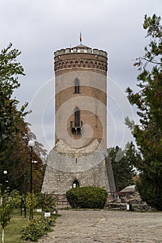 TÃÂ¢rgoviÃâ¢te castle, tower. Vlad the Impaler, Dracula`s old capital.  Cloudy sky. Romania